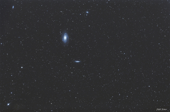 Messier 81 and Messier 82 with other small galaxies